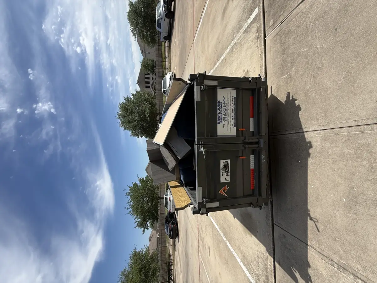 Commercial junk removal Pearland TX, Daw's trailer on job site