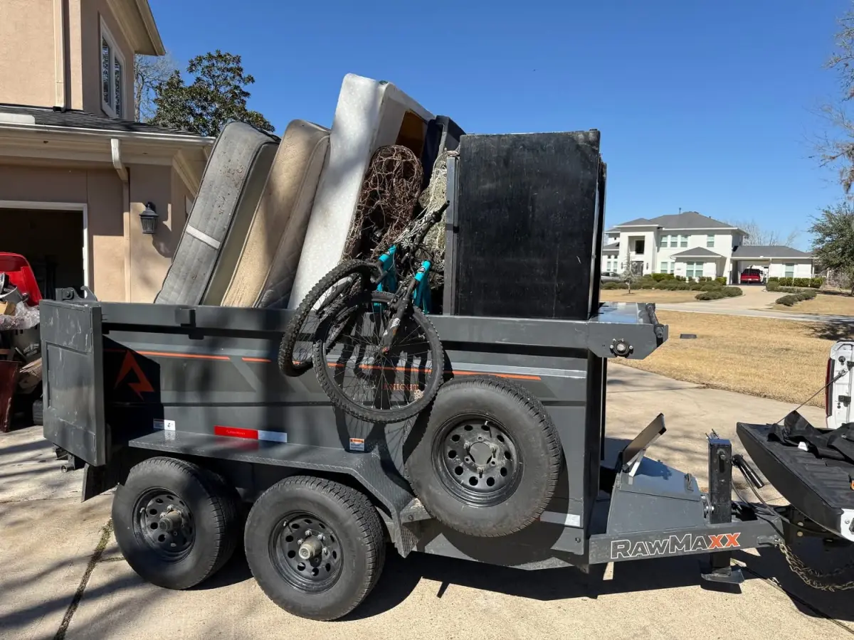 Home cleanout, RawMaxx trailer loaded with mattresses and appliances
